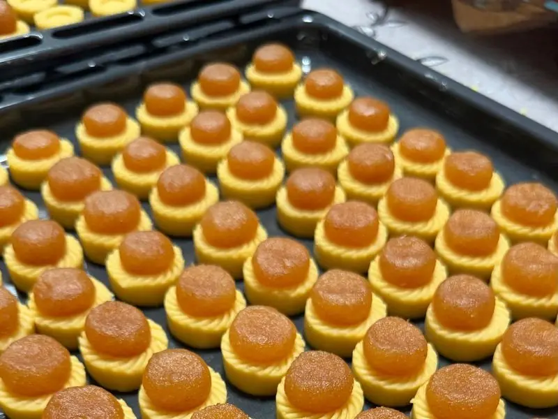 Close-up of pineapple tarts with jam centres