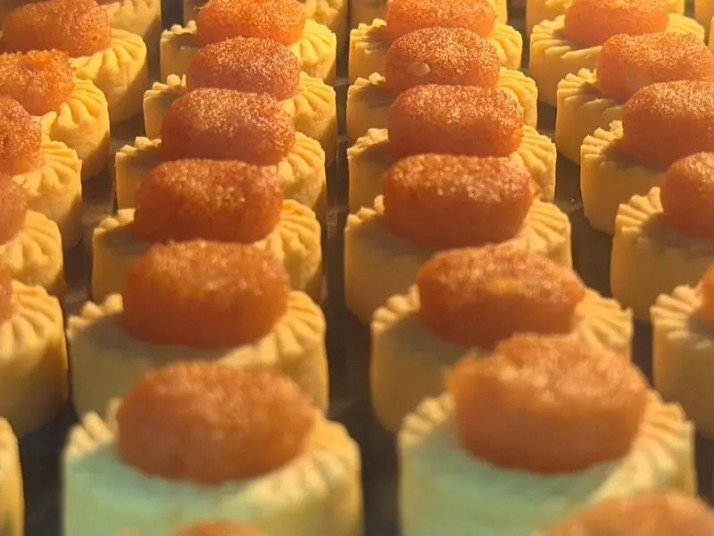 Pineapple tarts baking in warm oven light